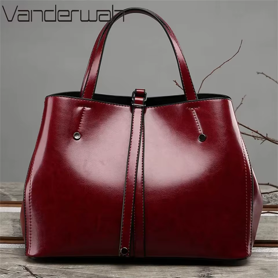 Sacs à main et bourses en cuir verni pour femmes
