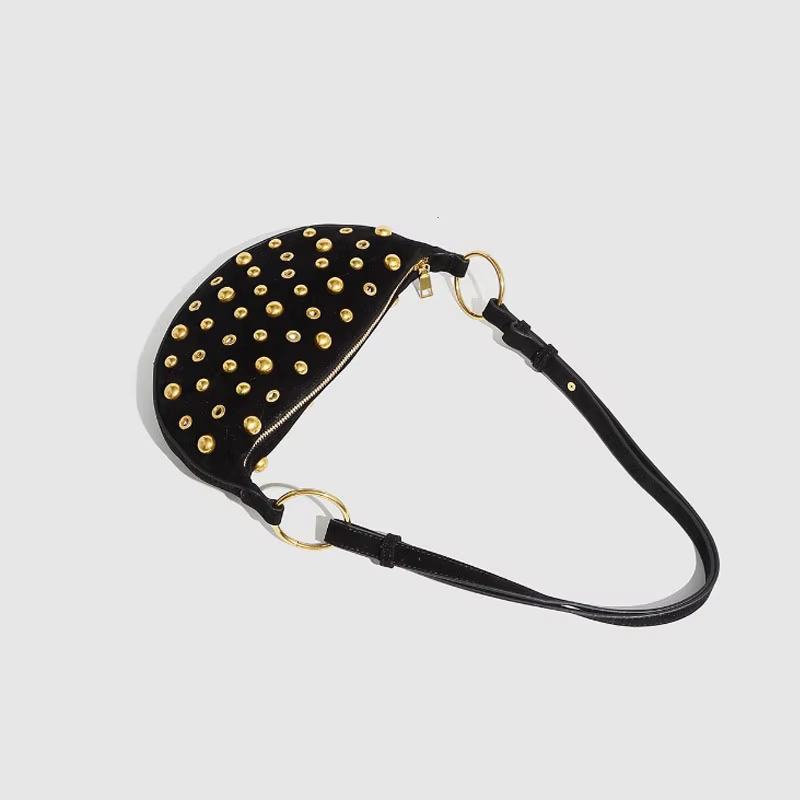 Sac à bandoulière clouté de styliste