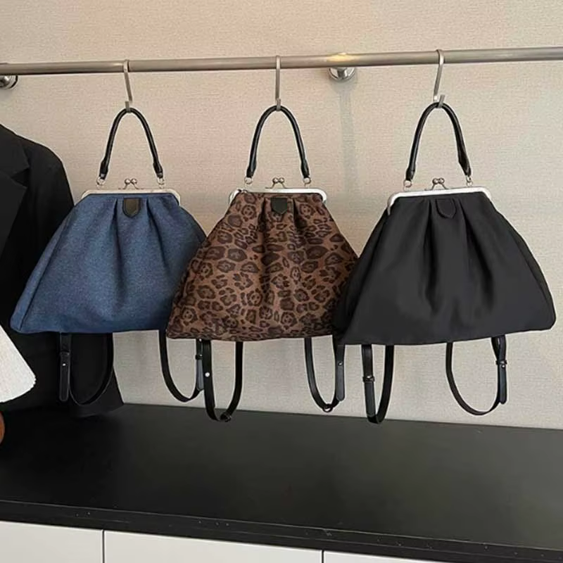 Sac à main pochette imprimé léopard pour femme avec fermoir métallique