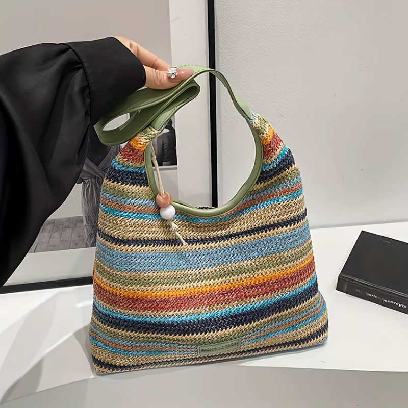Sac à main bohème multicolore à rayures avec décoration en pompon