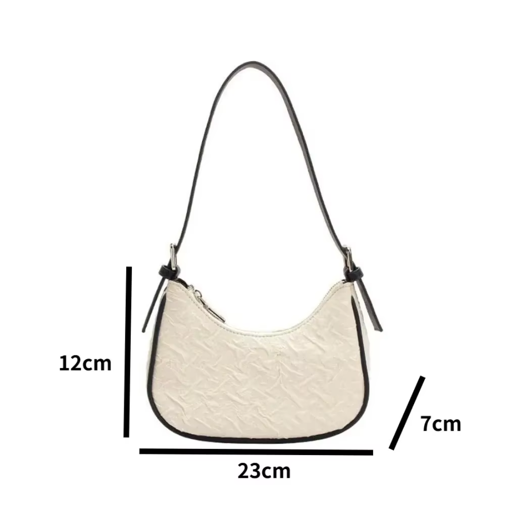 Sac plissé tendance de l'année, design original et raffiné, sac croissant pour femme, design de niche estival, sac porté épaule