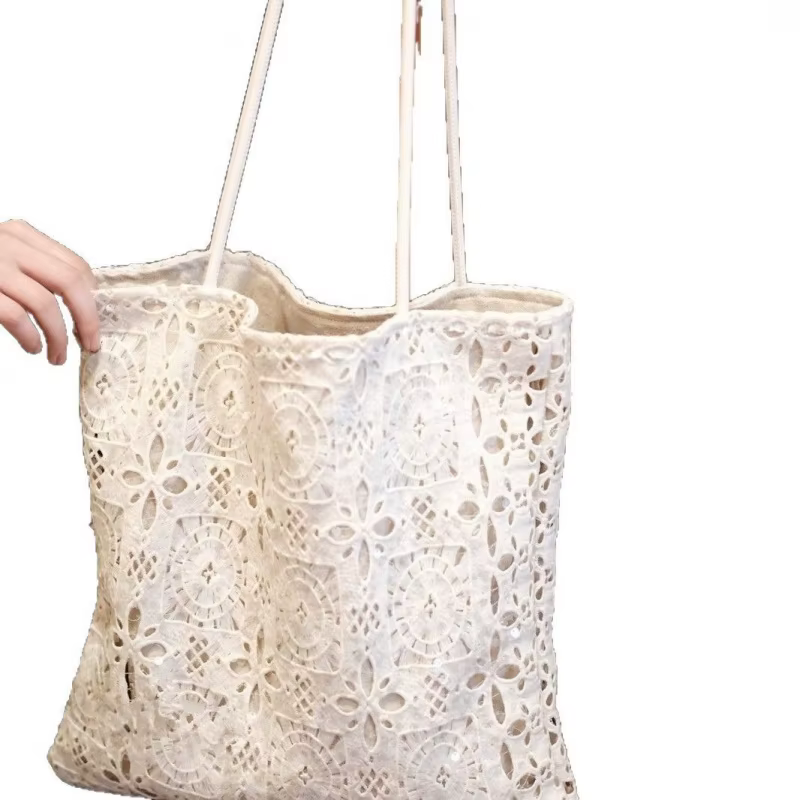 Sac à main blanc en dentelle à sequins