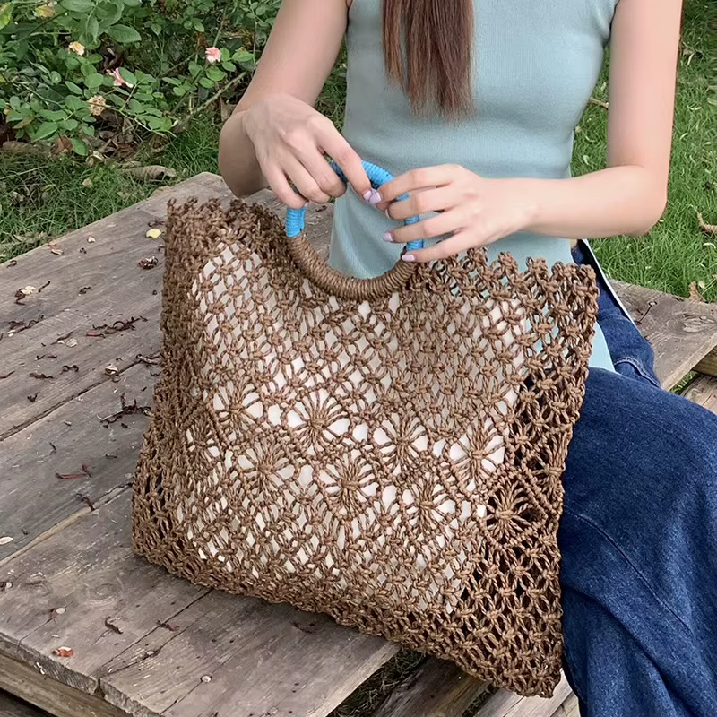 Sac de voyage en raphia et rotin