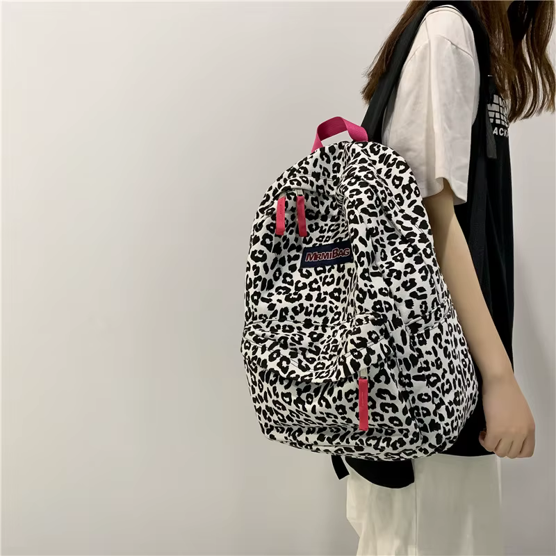 Sac à dos décontracté en toile à imprimé léopard pour femme