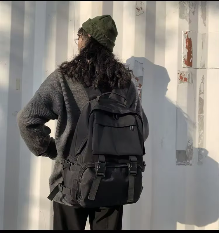 Nouveau sens de haut de gamme du cartable femme lycée campus grande capacité sac à dos travail vent sac à bandoulière mâle ins sac
