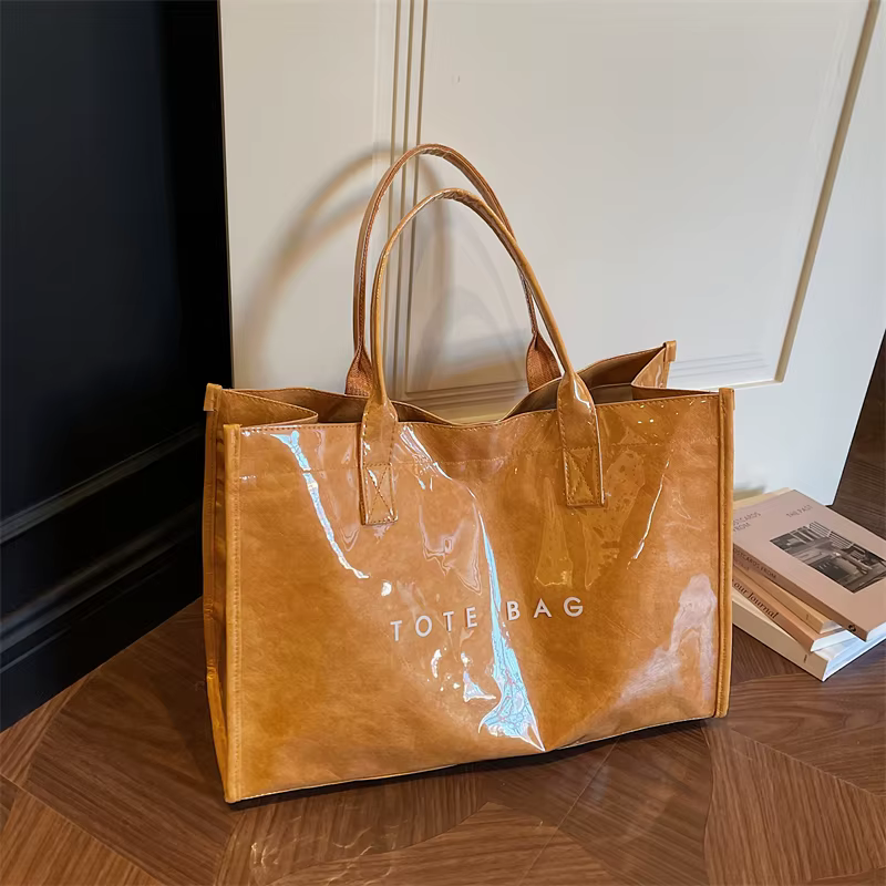 Nouveau Sac Fourre-tout Transparent en PVC Imperméable pour Femme 2026 – Style Papier Kraft Durable