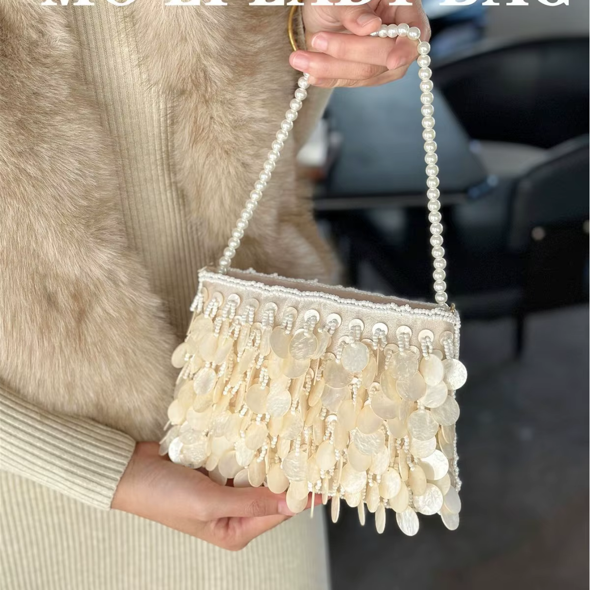 Pochette en perles de coquillage