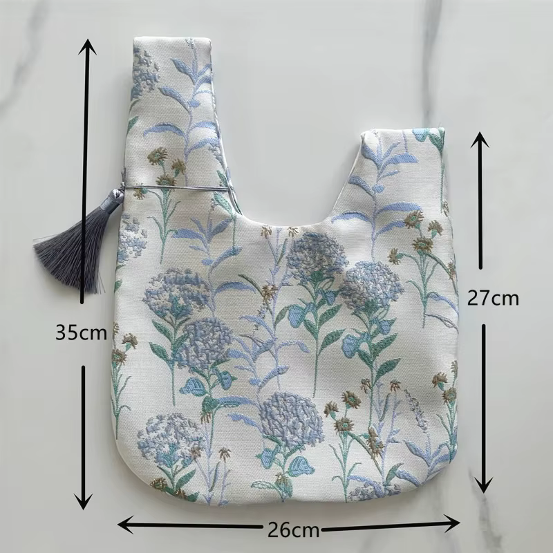 Sac à main en jacquard floral élégant avec nœud en satin et pompon