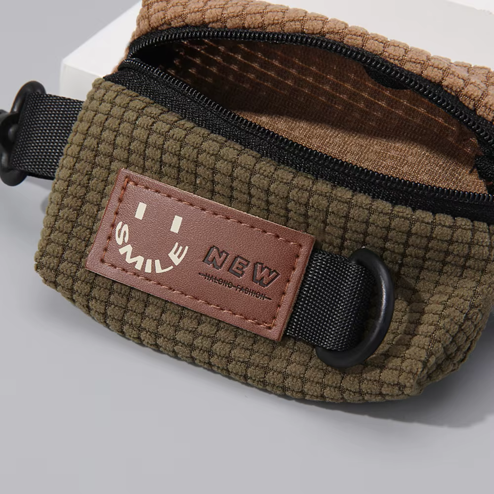 Mini pochette en velours côtelé pour clés et écouteurs