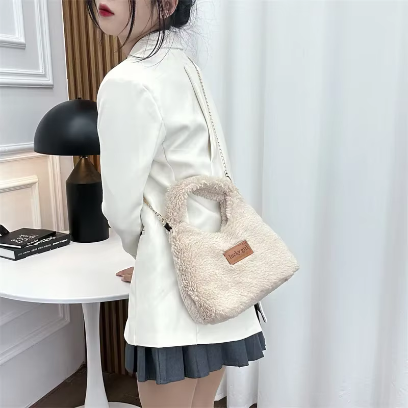Pochette Hobos en fausse laine d'agneau pour femme