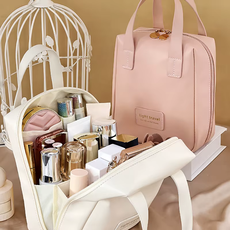 Sac à cosmétiques Portable de grande capacité, sac de rangement de maquillage étanche, sac de rangement de cosmétiques tendance de haute valeur esthétique