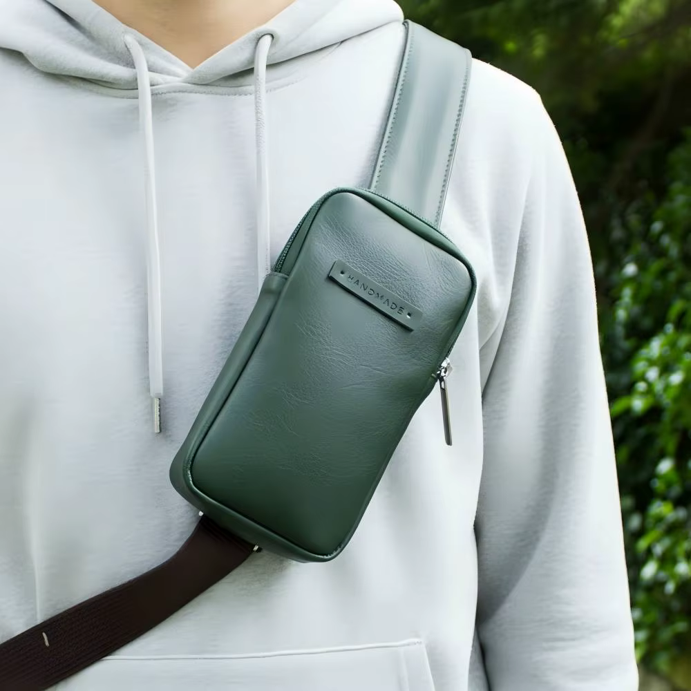 Sac à bandoulière avec poche pour téléphone sur sangle