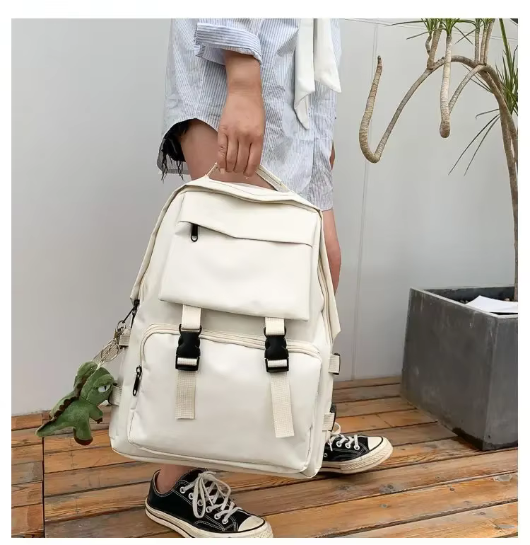 Nouveau sens de haut de gamme du cartable femme lycée campus grande capacité sac à dos travail vent sac à bandoulière mâle ins sac