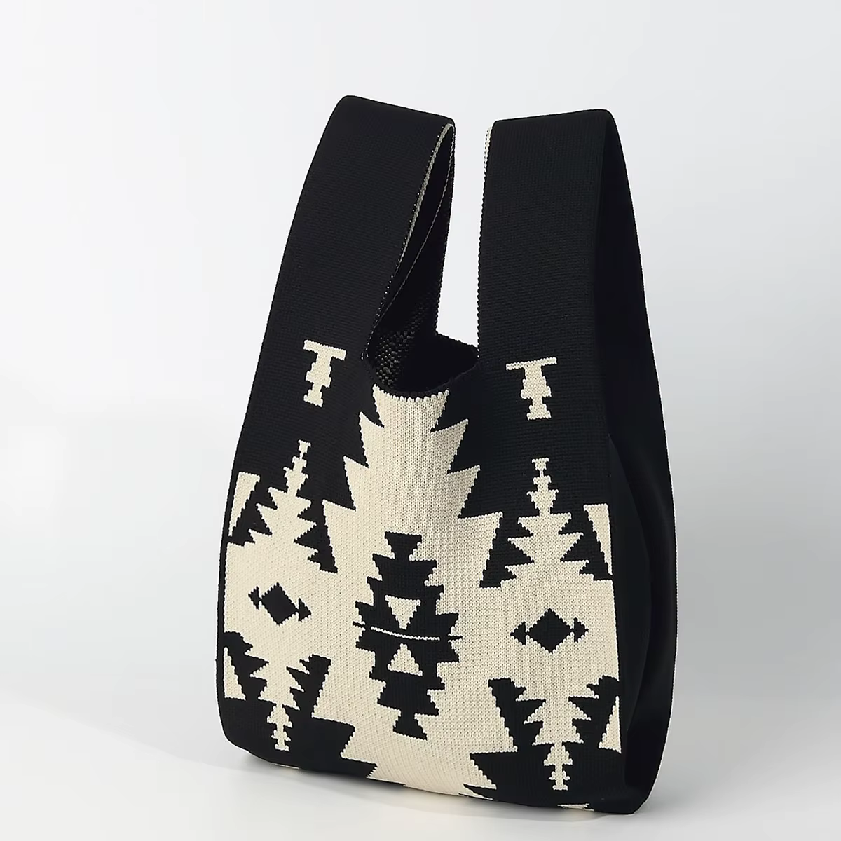 Sac à main de style ethnique bohème avec symétrie angulaire