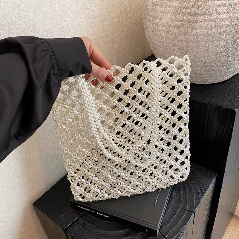 2025 nouveau sac de vacances d'été Boho plage évider sac à bandoulière pour les femmes à la main perles sac