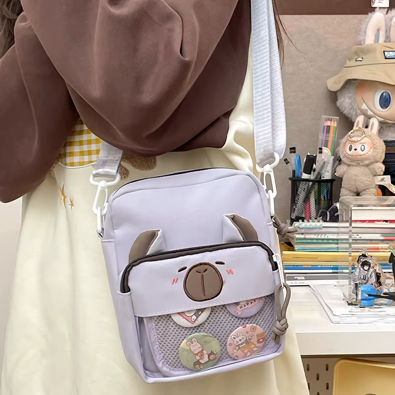 Sacs à bandoulière avec badge Capybara pour femme