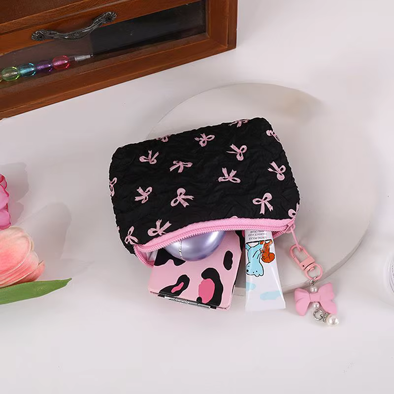 Trousse de maquillage en tissu avec nœud mignon