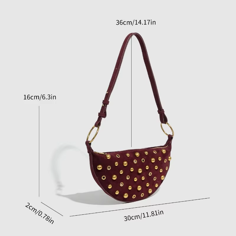 Sac à bandoulière clouté de styliste