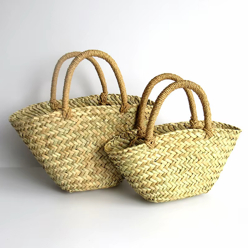 Sac à main triangulaire en herbe tissé Oblique