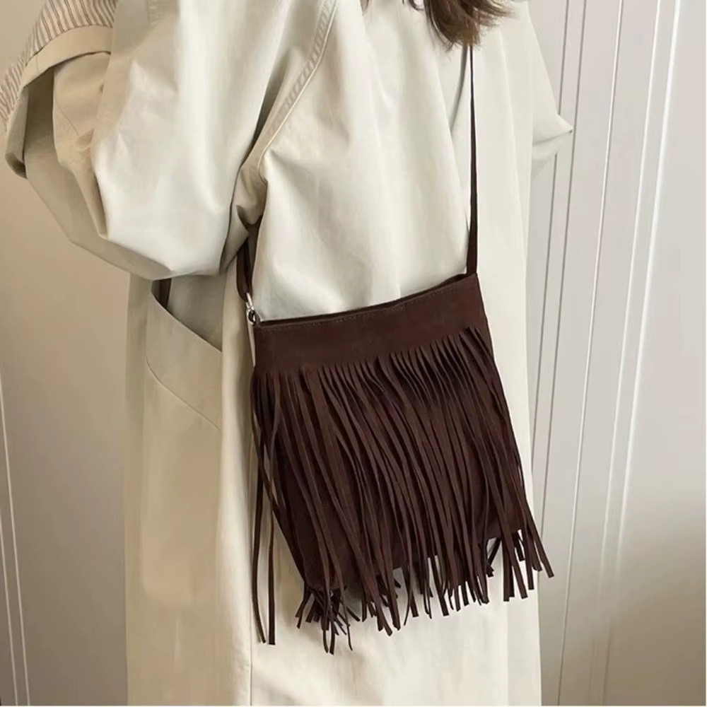 Sac bandoulière vintage en suède à franges