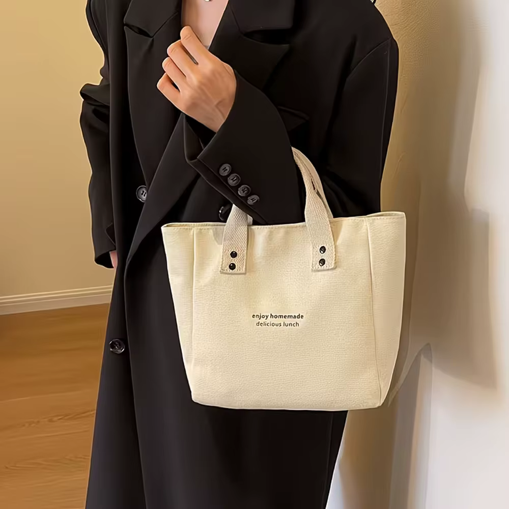 Sac fourre-tout décontracté en toile avec pendentif cloche et fermeture éclair ; ce sac
