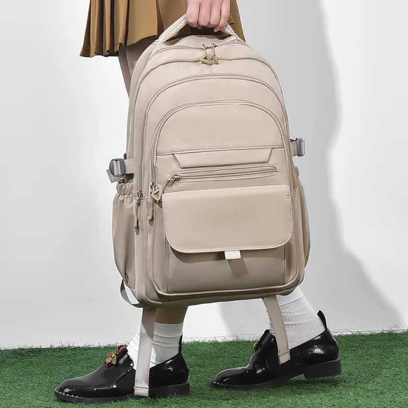 Un sac à dos multicouche imperméable et élégant Oxford grande capacité Simple banlieue hors sol étudiant sac à dos