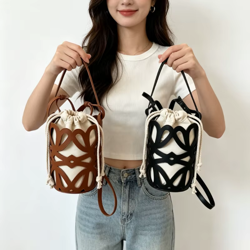 Sac à langer haut de gamme : élégant sac bandoulière pour femme avec logo de designer minimaliste et grande capacité