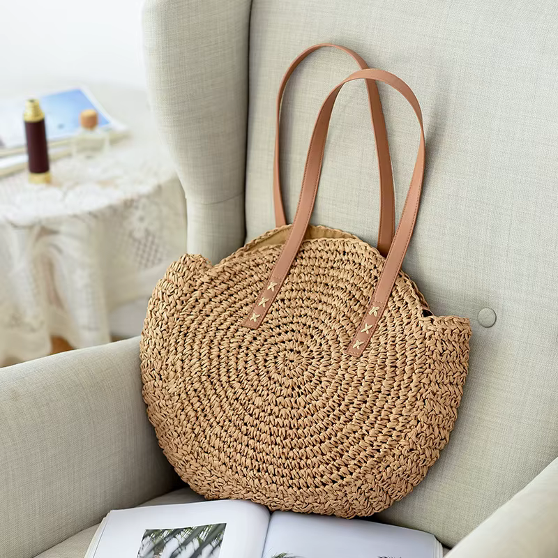 Sac à bandoulière rond en paille d'été pour femmes