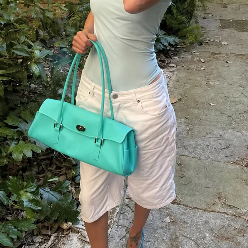 Sac bandoulière texturé en PVC à pois et blocs de couleur