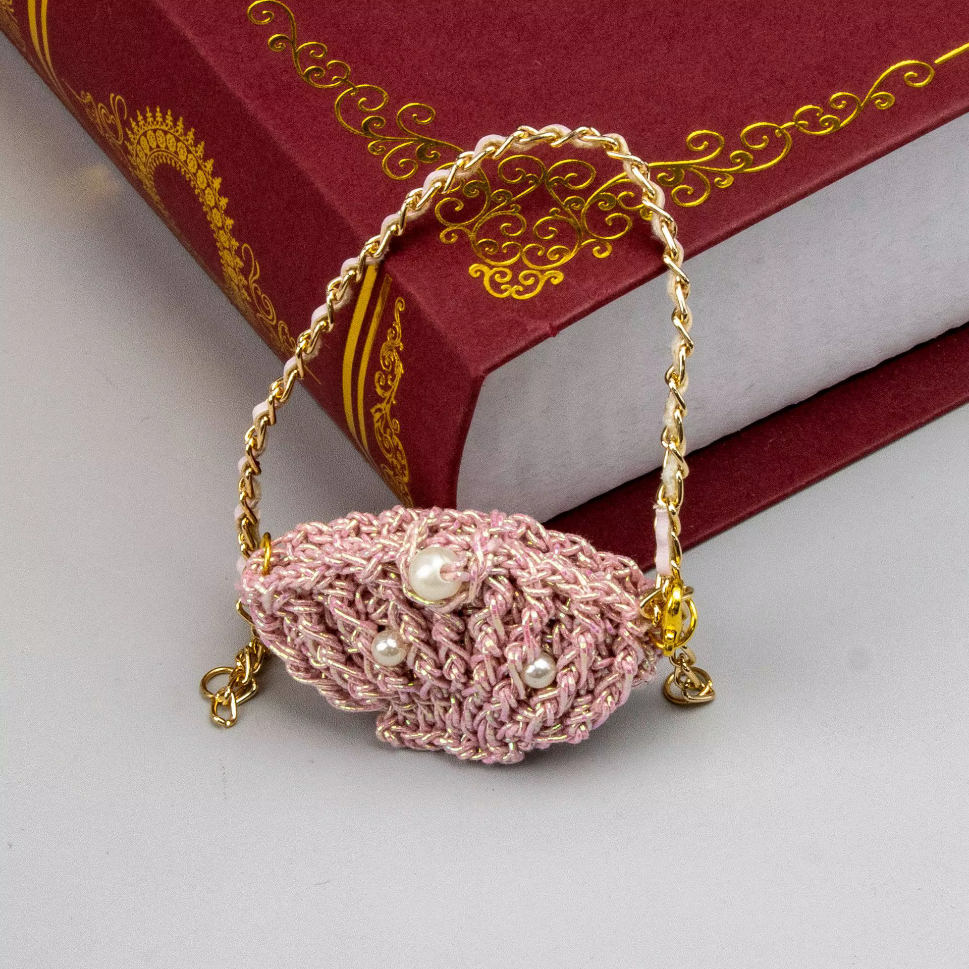 Petit sac carré en cuir tricoté à double poche