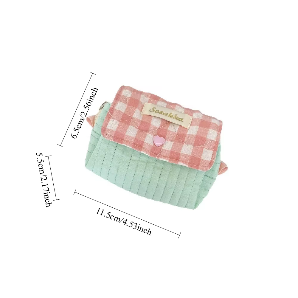 Pochette de maquillage verticale matelassée verte avec boucle rose