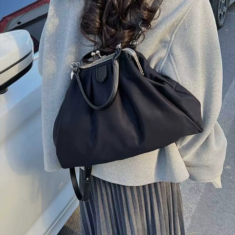 Sac à main pochette imprimé léopard pour femme avec fermoir métallique