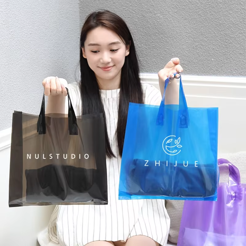 Sac en plastique perpétuel coloré avec poignée