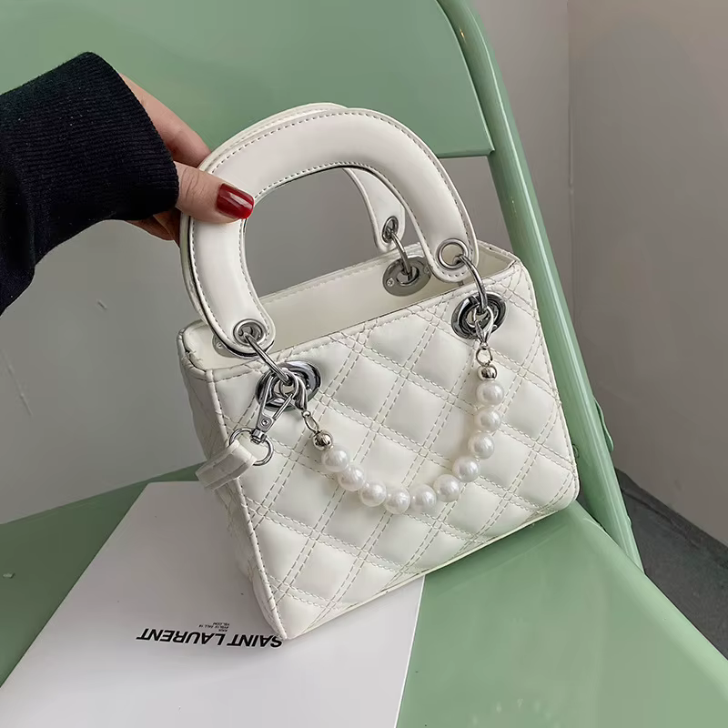 Sac à main élégant en perles