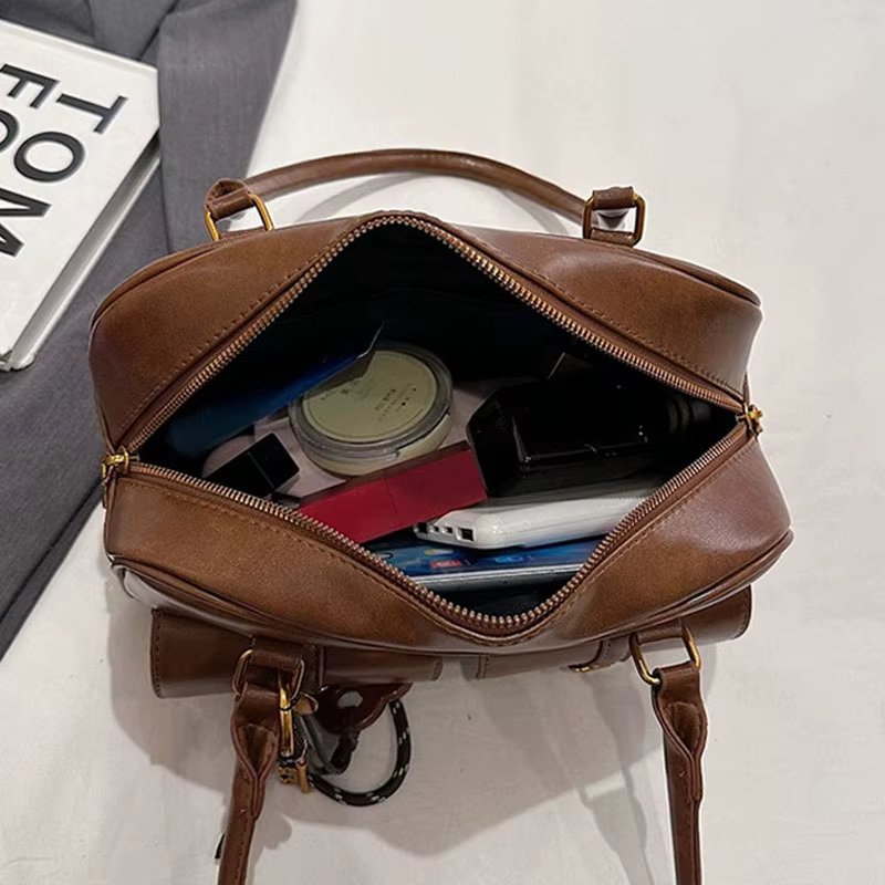 Sac à bandoulière rétro en cuir de couleur unie pour femmes