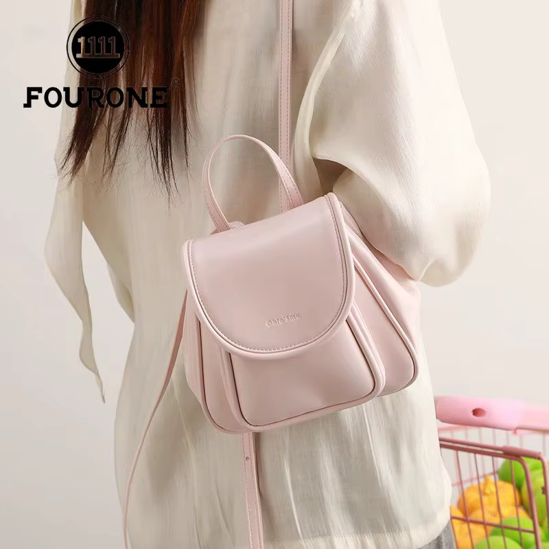 Printemps été poignée Mini sac à dos filles 2025 paquet nouveau un sac à bandoulière mode coréenne sac à dos femmes Pu cartable