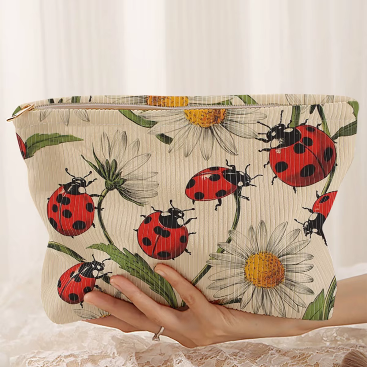 Trousse de maquillage en velours côtelé à motif coccinelle