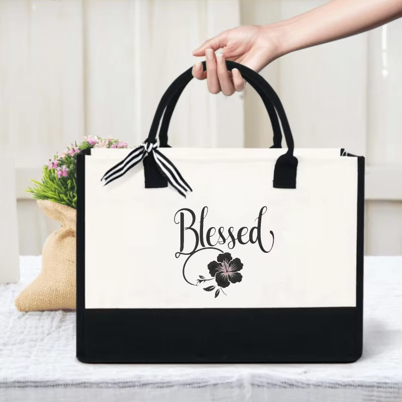 Sac fourre-tout en toile au design floral blanc et noir pour un usage quotidien
