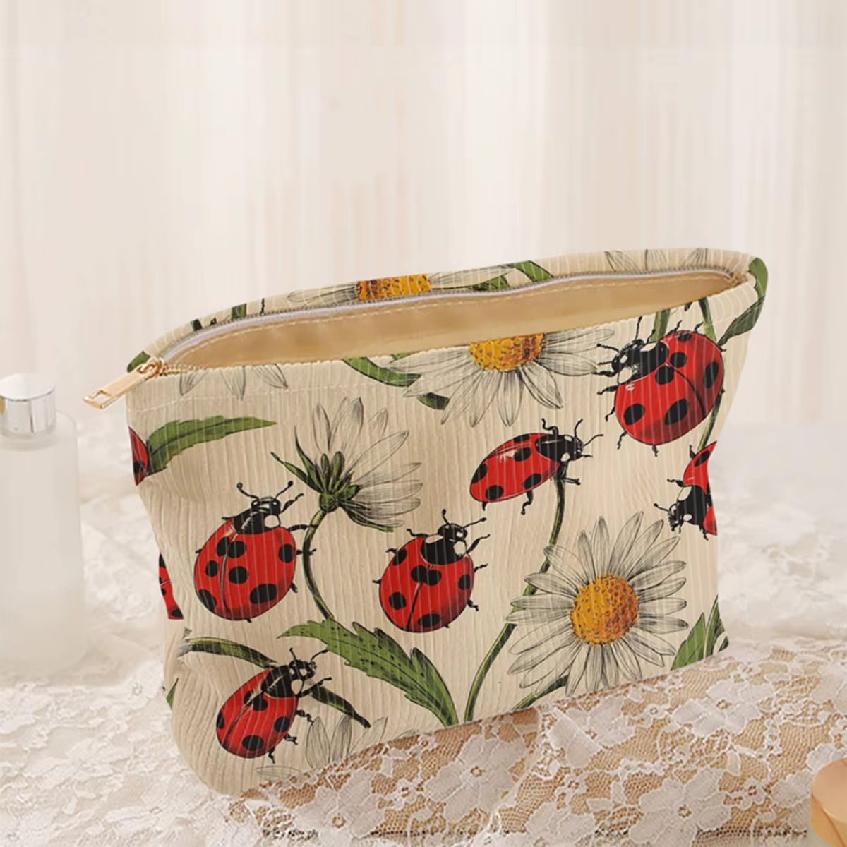 Trousse de maquillage en velours côtelé à motif coccinelle