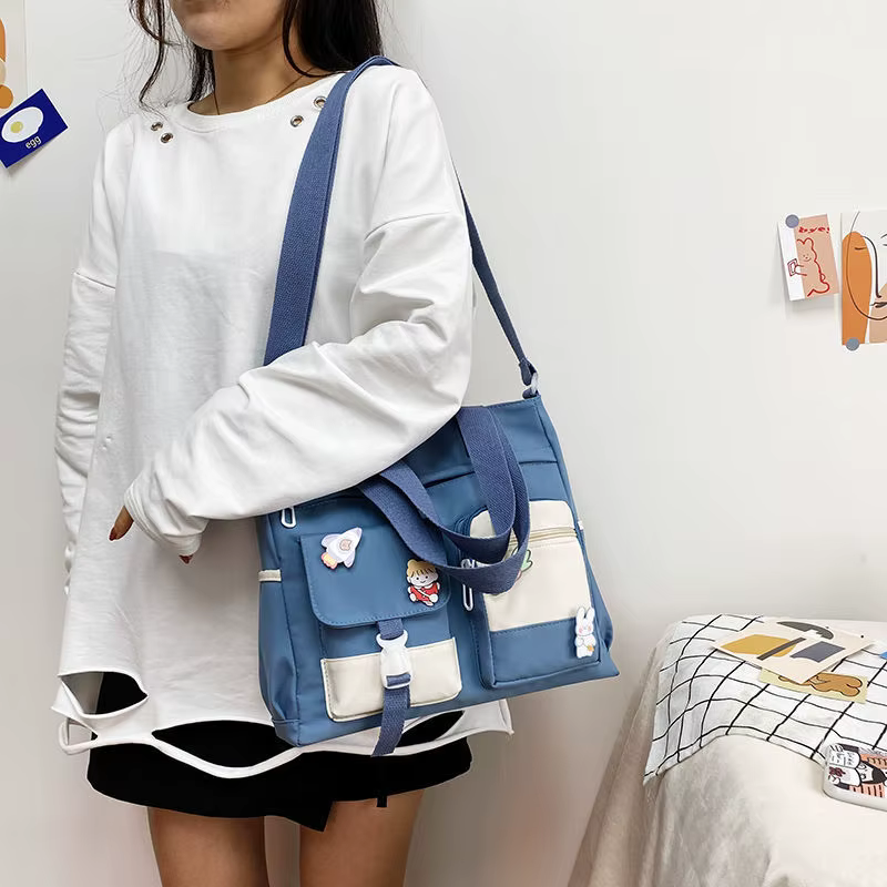 Nouveau sac à main d'école de créateur sac de messager pour les jeunes adolescentes sac à bandoulière fourre-tout