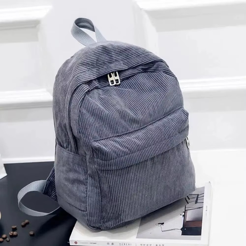 Nouveaux sacs à dos en velours côtelé pour hommes et femmes avec style universitaire