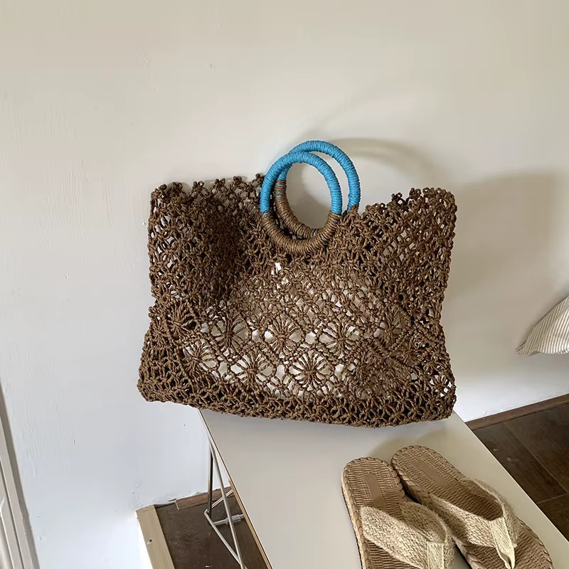 Sac de voyage en raphia et rotin