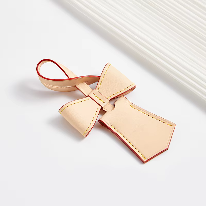 Breloque en cuir avec nœud pour sac pour femmes