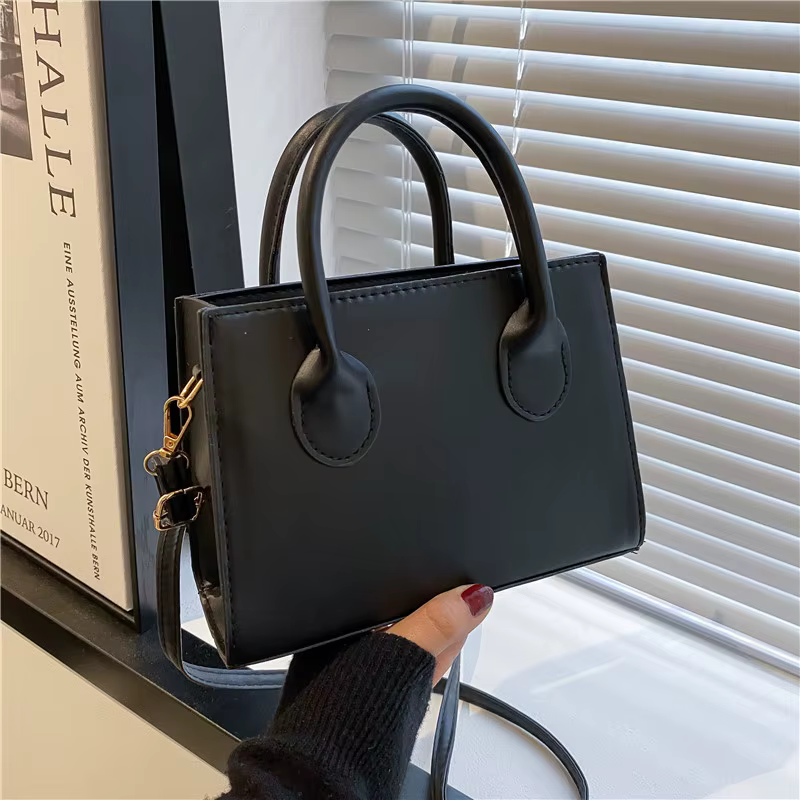Elegant Black Handbag with Dual Handles