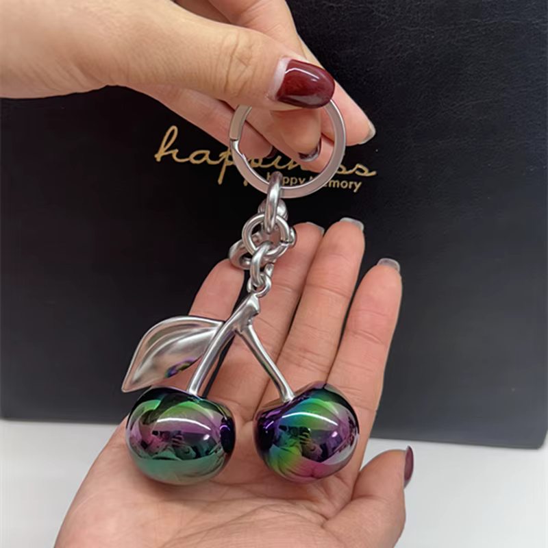 Pendentif cerise de couleur dégradée pour sac à main d'entraîneur