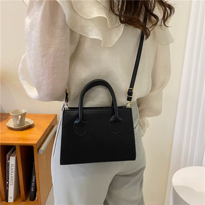 Elegant Black Handbag with Dual Handles