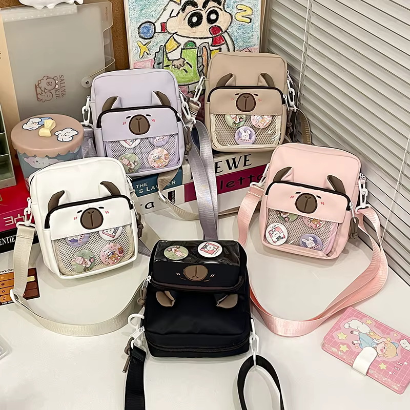 Sacs à bandoulière avec badge Capybara pour femme